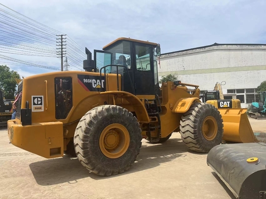 Подержанные колесные погрузчики CAT966H с массой машины 6000 кг. Включается и другой гидравлический насос