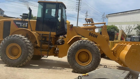 Подержанные колесные погрузчики CAT966H с массой машины 6000 кг. Включается и другой гидравлический насос
