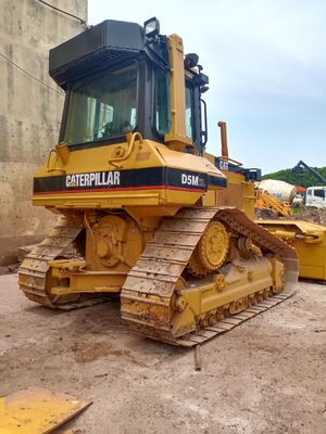 Строительная машина мини бульдозер Caterpillar CAT D5M с пропускной способностью 2,8 м3
