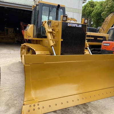 Желтый использованный бульдозер Caterpillar D7G2 с другой емкостью ведра в продаже