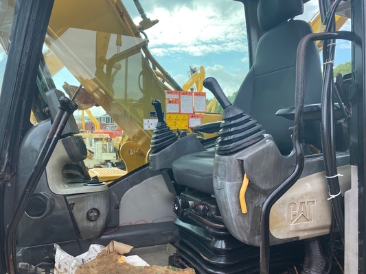 Отличное состояние использованный экскаватор Caterpillar CAT 318D с небольшим рабочим временем 0-2000