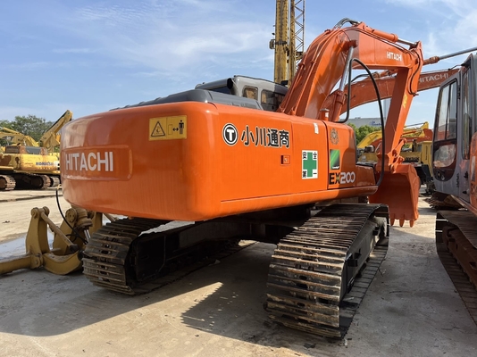 Подержанный экскаватор Hitachi EX200-3 в хорошем рабочем состоянии по доступной цене с красным цветом