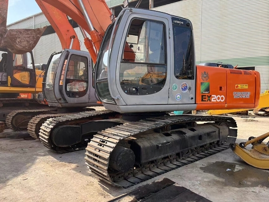 Подержанный экскаватор Hitachi EX200-3 в хорошем рабочем состоянии по доступной цене с красным цветом