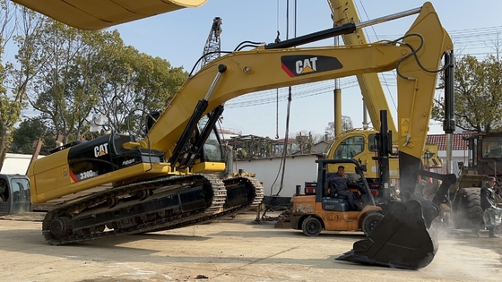 Япония Используется экскаватор CAT 330D2 и подержанный для повышения эффективности строительства