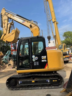 В хорошем состоянии использованная колесная экскаваторная машина CAT 307E2 масса 20000 кг