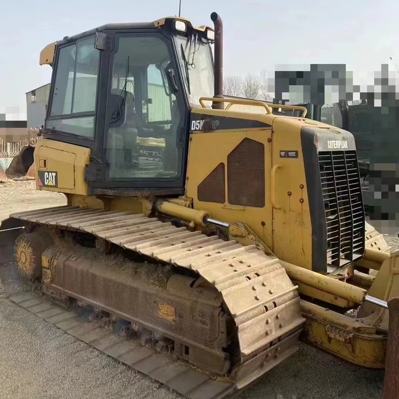 Доступный тракторный дозер CAT D5K с небольшим рабочим временем и хорошим состоянием