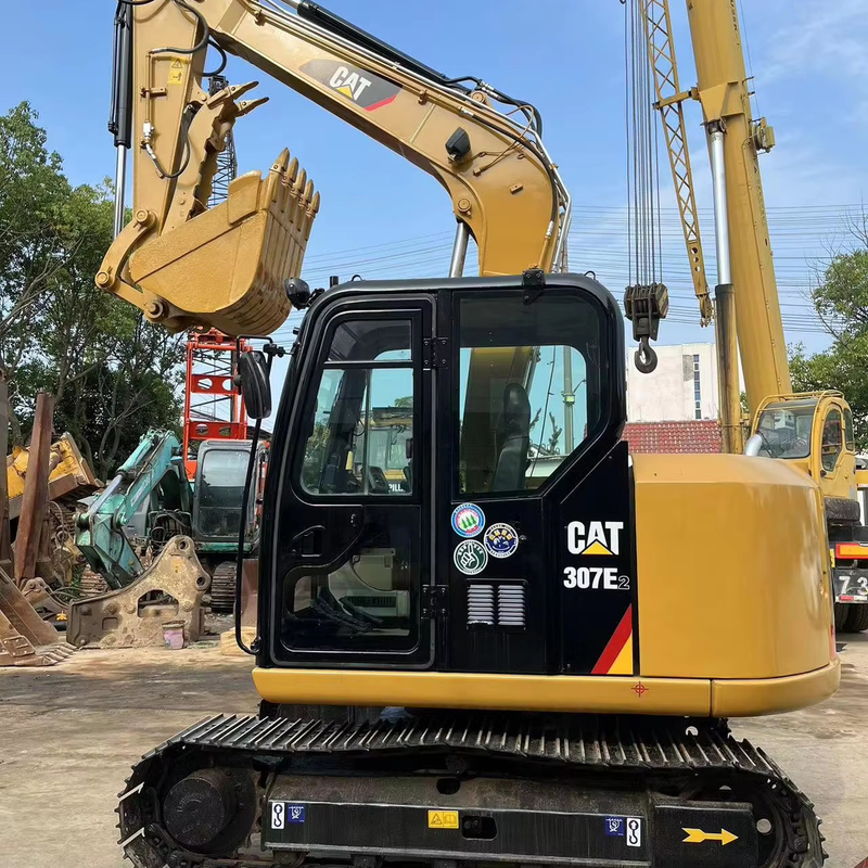 В хорошем состоянии использованная колесная экскаваторная машина CAT 307E2 масса 20000 кг
